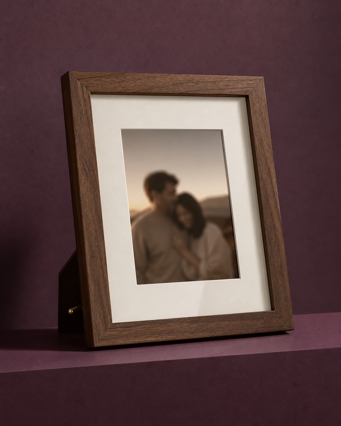 Walnut photograph frame on a mulberry studio background